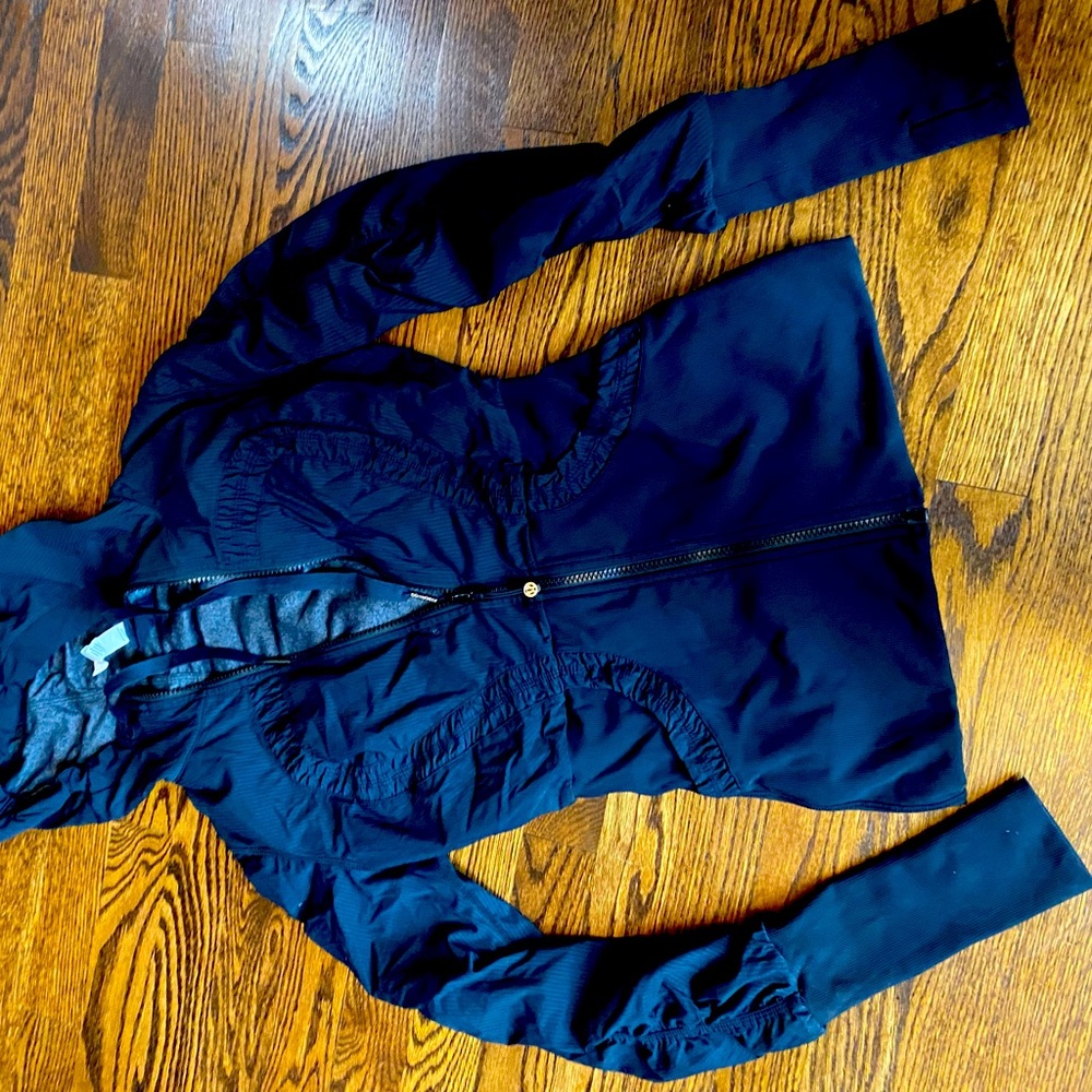Lululemon black lined nylon hooded full zipper jacket.